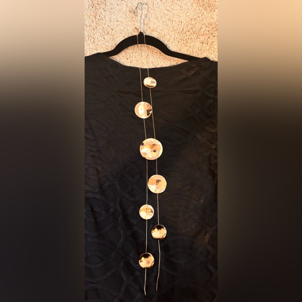 Long Gold Disc Station Necklace on Black Textured Fabric